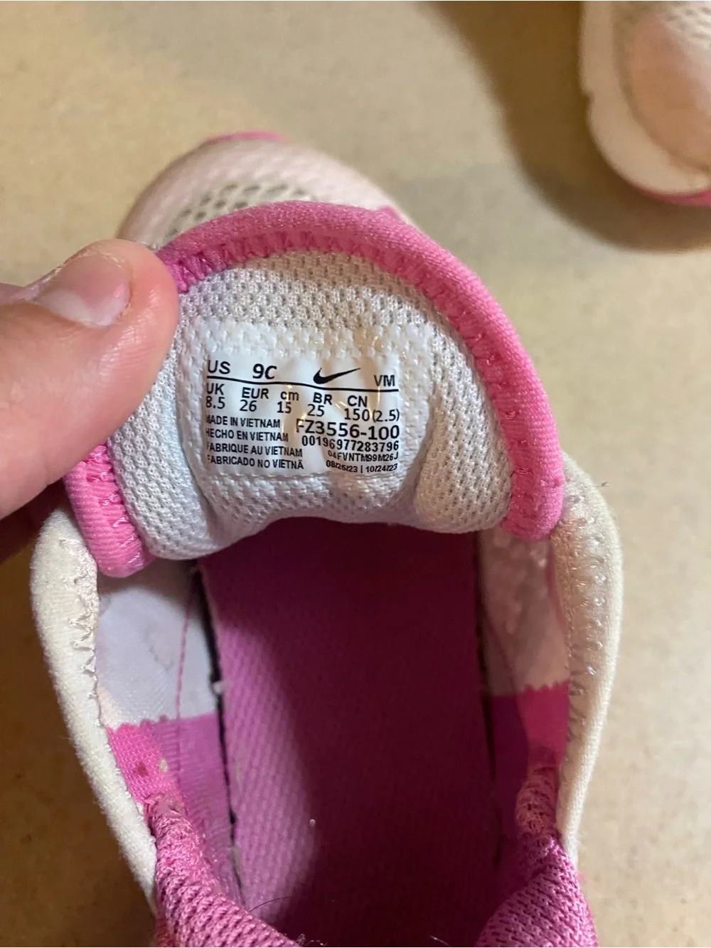 Nike Kids White and Pink Slip-On Sneakers